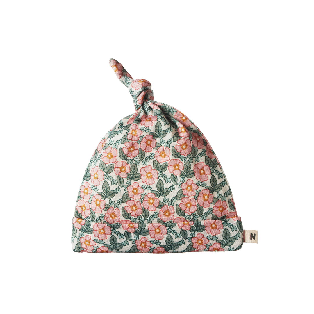 NATURE BABY - MERINO ESSENTIAL KNOTTED BEANIE: DAISY BELLE PRINT