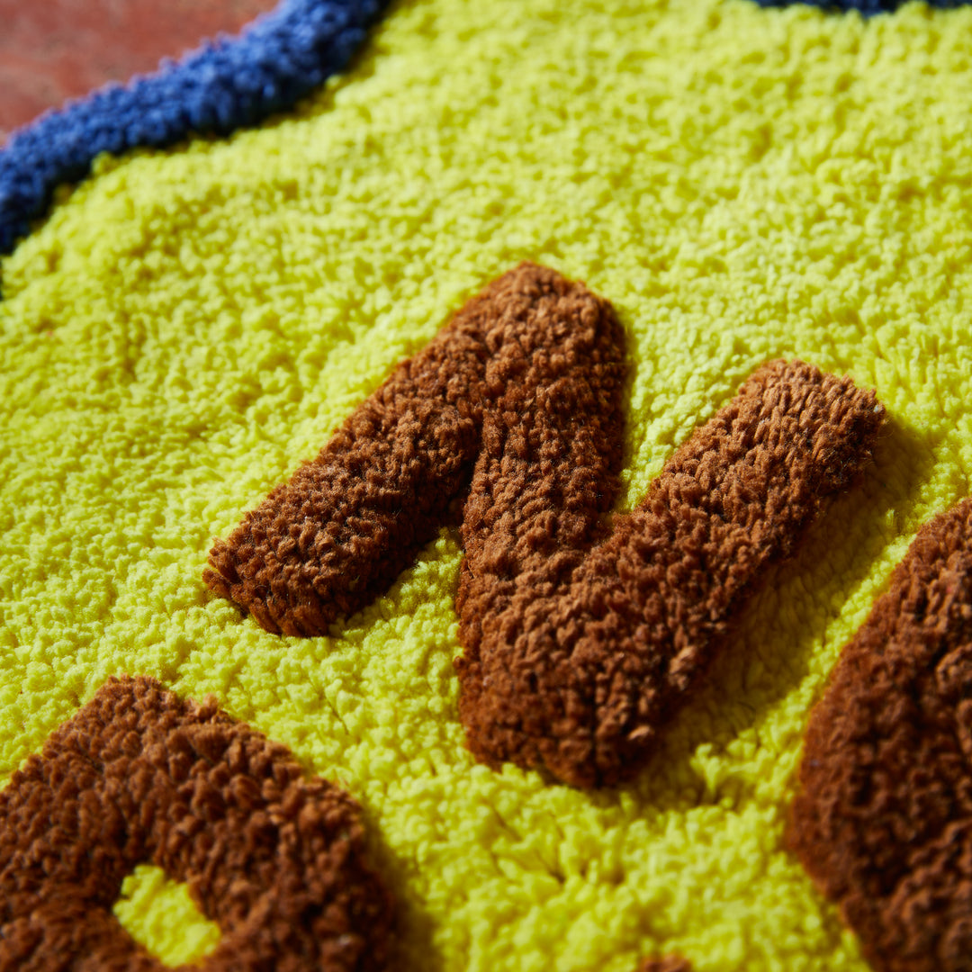 SAGE X CLARE - AMALIE NUDIE BATH MAT: DAFFODIL