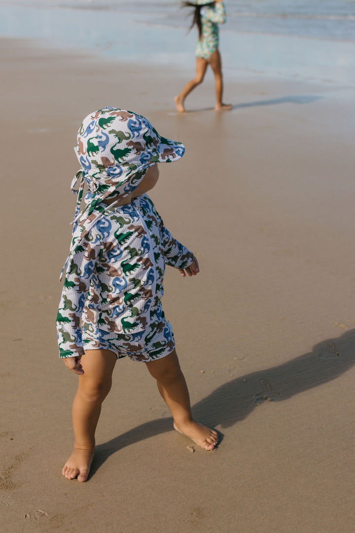 ACORN KIDS - SWIM FLAP CAP: T REX [sz:S - 50CM/9-18 MTHS]