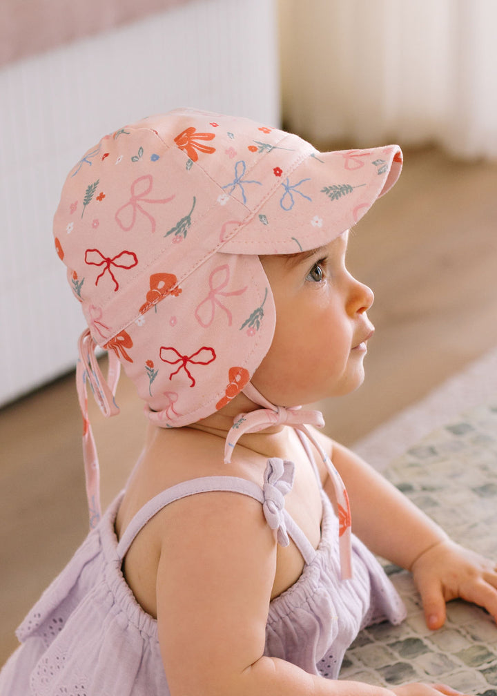 ACORN KIDS - FLAP HAT SOFT JERSEY: LITTLE BOWS [sz:XS - 46CM/0-9 MTHS]
