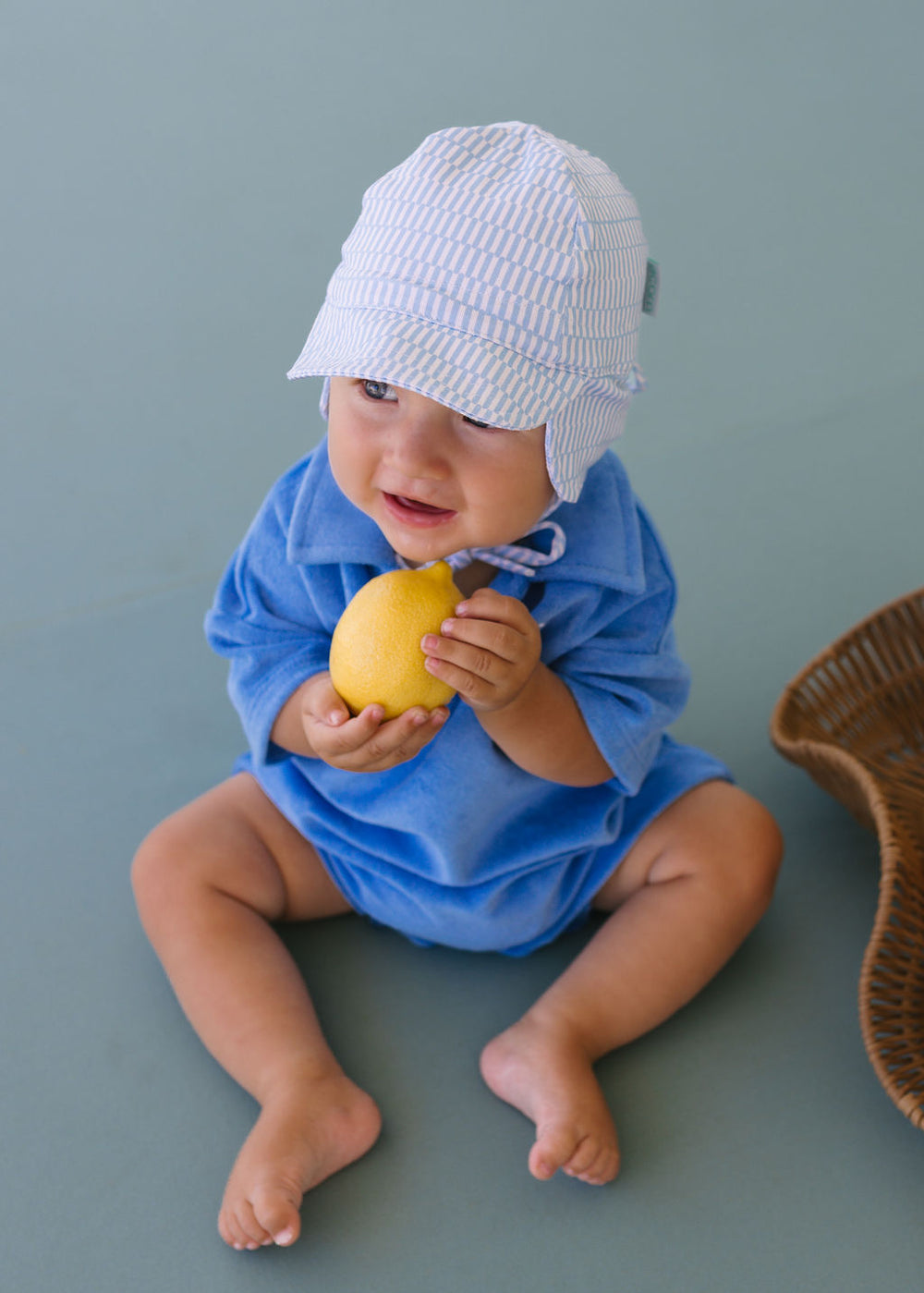 ACORN KIDS - FLAP HAT SOFT JERSEY: BLUE SPRINKLE [sz:XS - 46CM/0-9 MTHS]