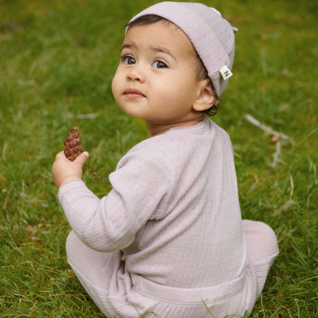NATURE BABY - MERINO LONG SLEEVE BODYSUIT POINTELLE: LILAC [sz:NB]
