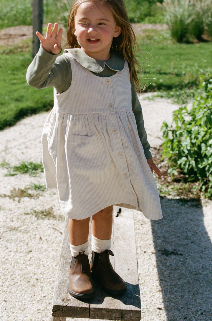 NATURE BABY - SPRINTER COLLECTION: WILLA PINAFORE ECRU [sz:6-12 MTHS]