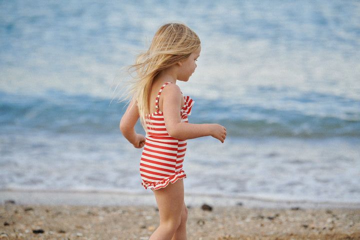 NATURE BABY - FRILL SWIMSUIT: RED SEA STRIPE [sz:6-12 MTHS]