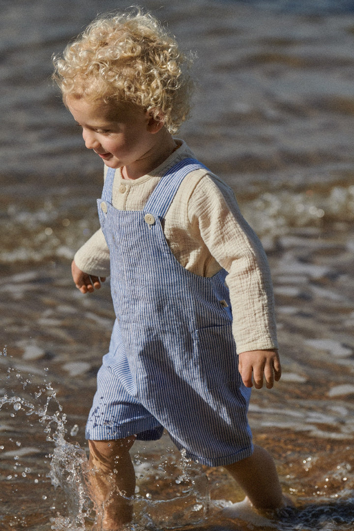 NATURE BABY - TUCKER SHORTIE OVERALLS: LINEN BLUE STRIPE [sz:6-12 MTHS]